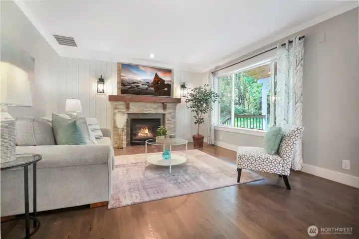 Another view of the family room with gorgeous real hardwood floors.