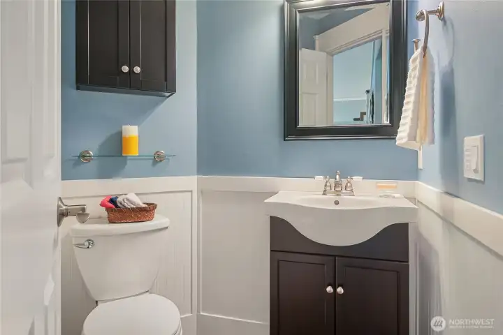 The powder room on the main floor features a beadboard accent.