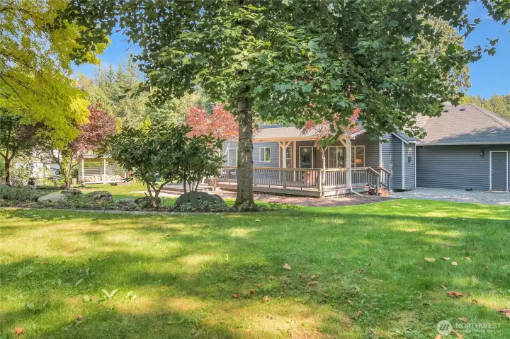 The yard offers a variety of areas for entertaining.