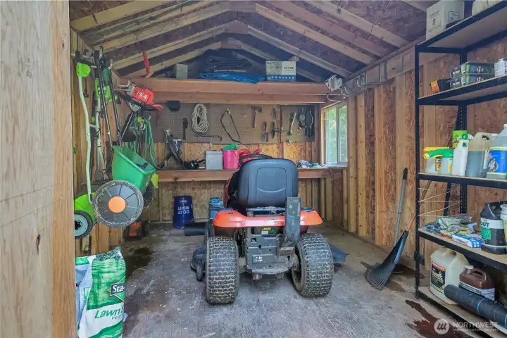The storage shed offers an extra space to store yard equipment. The riding lawn mower will remain with the home.