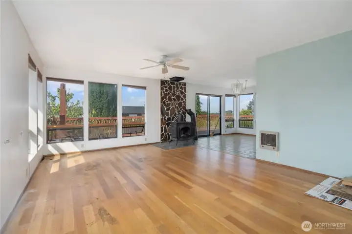 Open main level with hardwood floors.