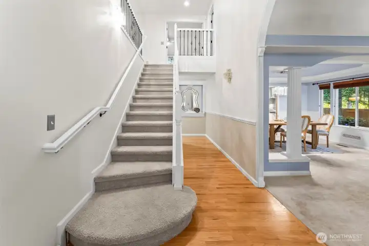 Hardwood floors and newer carpet add warmth and timeless appeal.