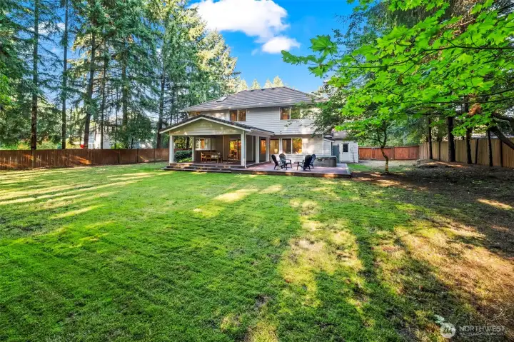 Fully fenced backyard offers space to play and relax.