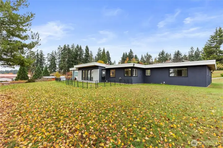 Spacious exterior spaces with room to garden, play and take in view.