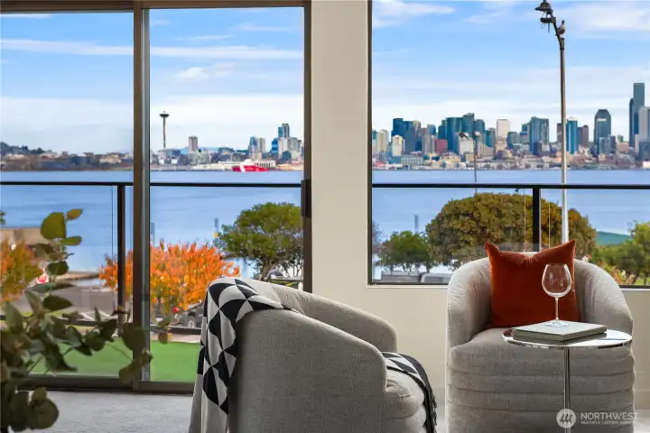 Just off the living room and dining room is a full width deck with a storage room.