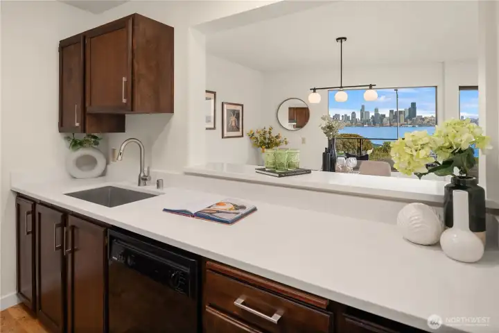 The high bar is the perfect serving window or breakfast bar.