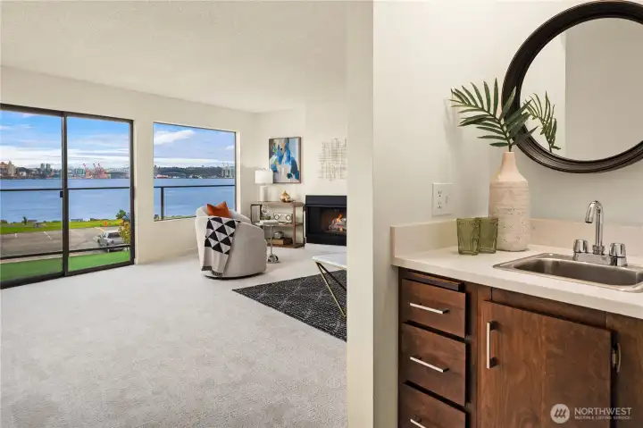 Just off the kitchen is this bonus sink and cabinetry. A painted louver door is stored in the laundry room if desired.