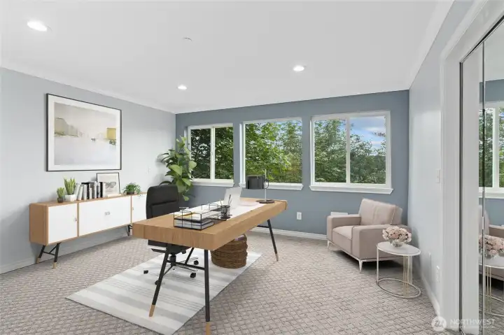 3rd bedroom (downstairs) w/ WIC - virtually staged as a office.