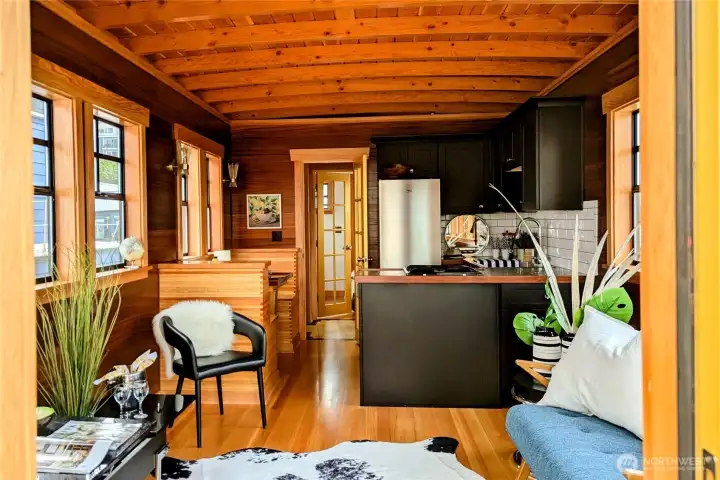 Coved fir ceilings, fir floors and solid mahogany walls