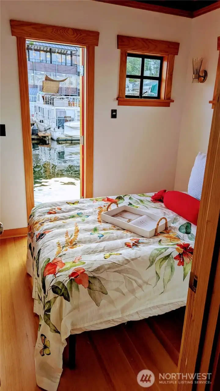 Bedroom fits a queen or you could have custom built in bed with lots of extra storage below.