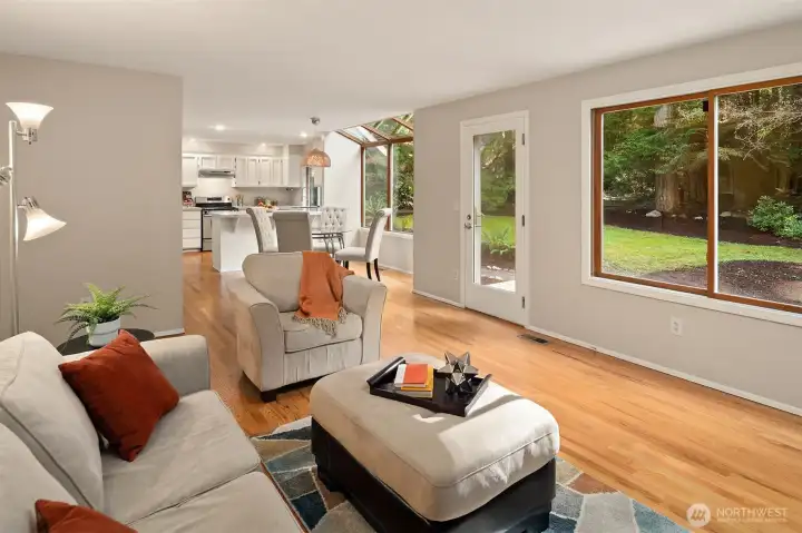 Your kitchen boast new Quartz counters, stainless appliances, tons of storage, seating, and a tranquil forested outlook.