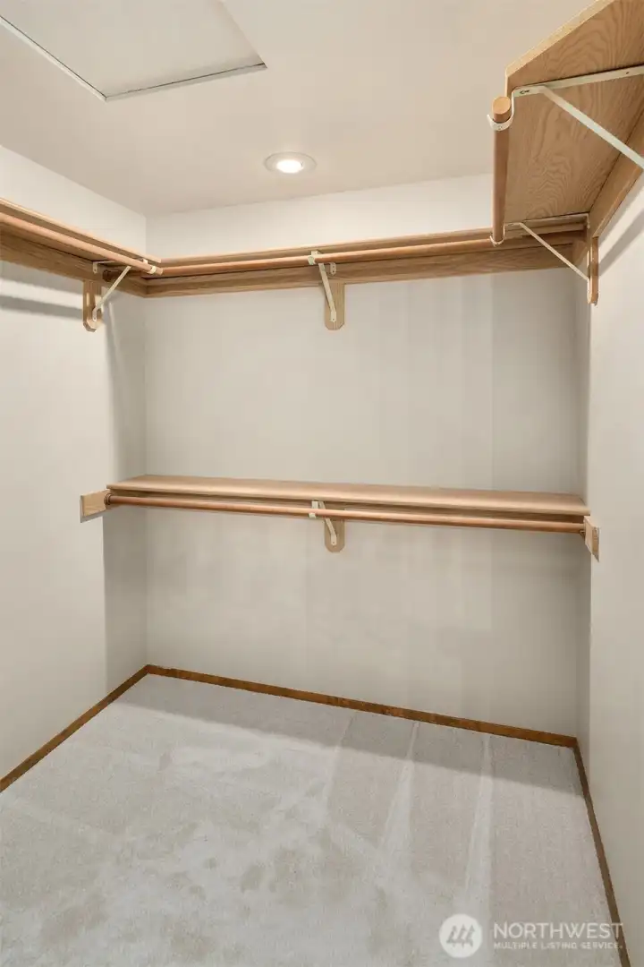 Primary walk-in closet.