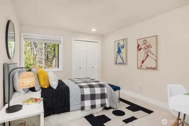 Three additional bedrooms and a full bath are thoughtfully positioned on the upper level. Bedroom #1