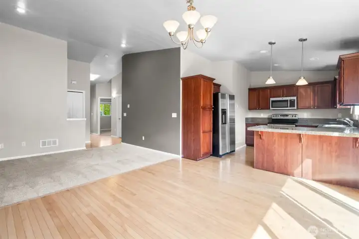 Open living, dining, and kitchen spaces designed for both everyday living and easy entertaining.