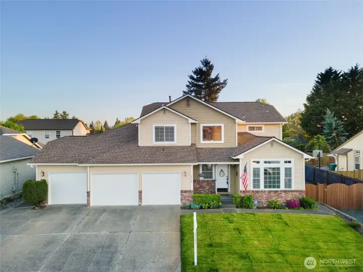 front of 3 car garage 4 bedroom 4 bath home