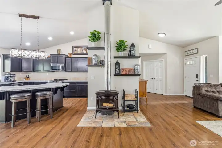 Wood burning stove provides cozy environment and heats the home.