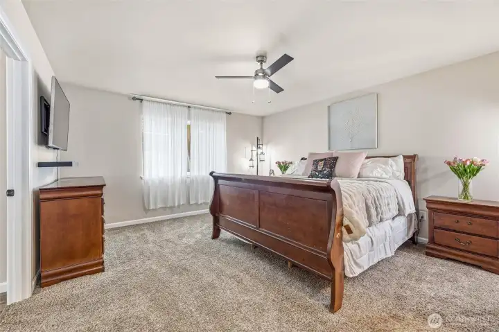 Spacious primary bedroom with large ensuite.