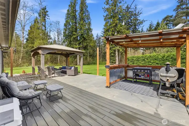 Wonderful outdoor living with this expansive composite deck, gazebo and covered bbq area.