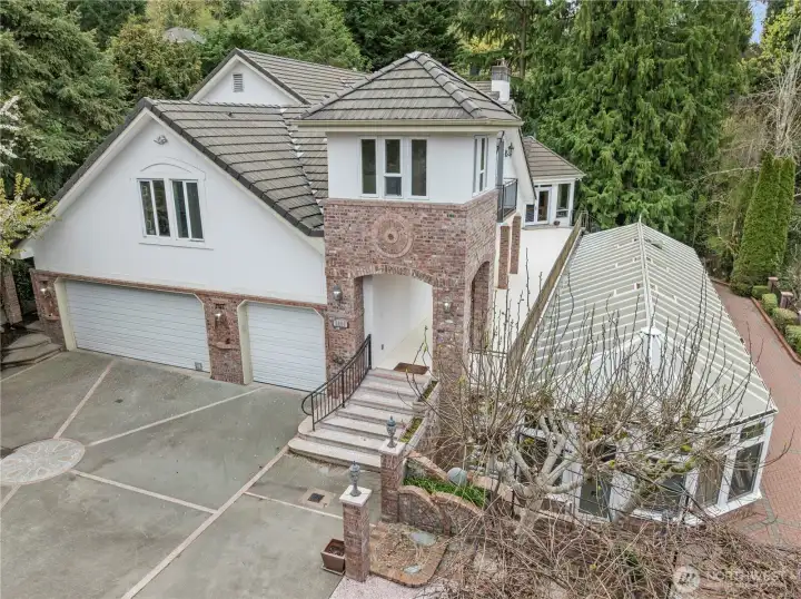 Oversized 3 car garage & large driveway offer lots of parking