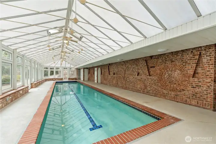 The atrium & pool are gorgeous but the custom brickwork on the wall takes it to another level.