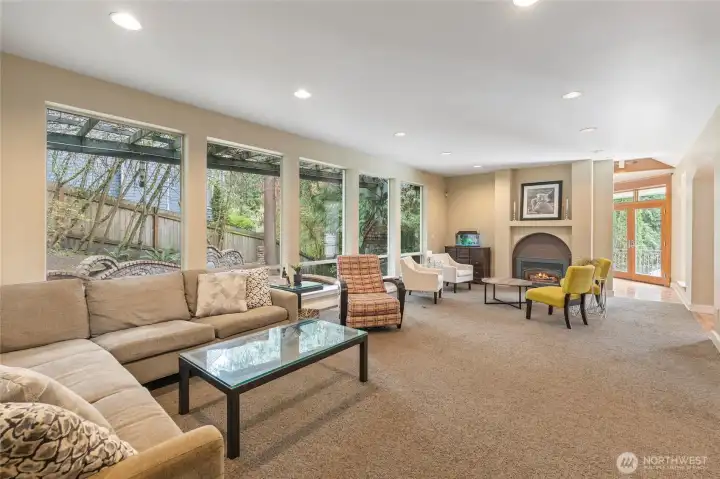 Spacious living room with gas fireplace. The fireplace also has a blower & will make the living room & the house nice & cozy.