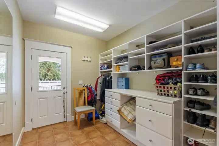 Great mud room! Store all your coats & shoes in here or turn it into a work space-so many possibilities! Heated tile floors in here too,