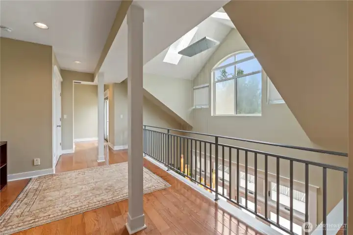 Spacious hallway with lots of natural light.
