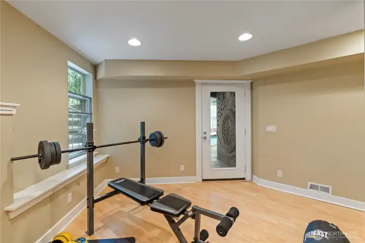Workout area, second den, craft room... How would you use this area?  Go thru the door & you're at the pool.