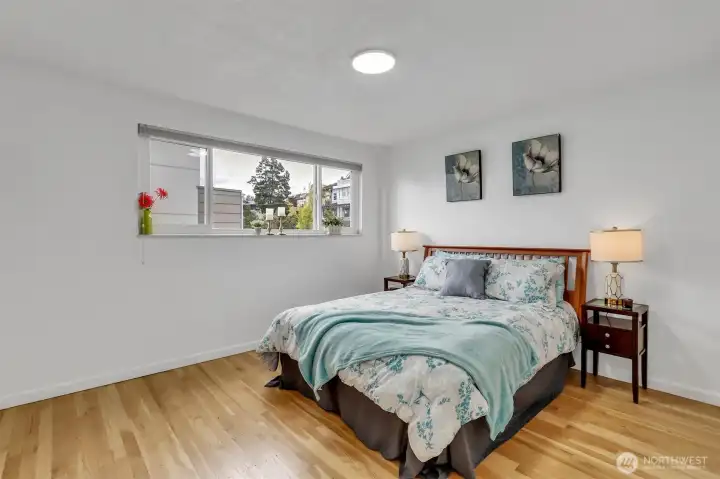 The bedroom is very spacious. This is a queen size bed. There is plenty of space for a king.