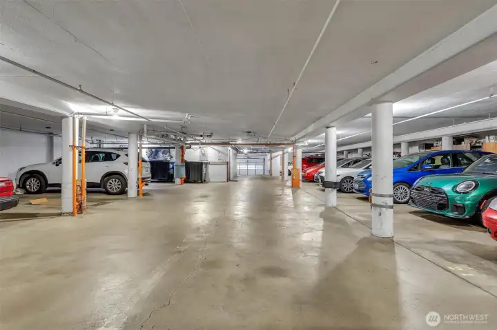 The parking garage has 18 indoor spaces and there are 12 outdoor parking spots. Spaces are available by waitlist for rent monthly for $40/month outside and $80/month inside. Currently no one on the waitlist!