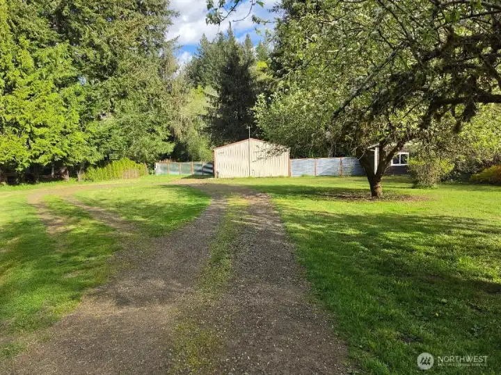 The shop is set way back from the paved road.