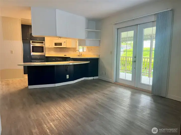 Large space for a dining table, french doors that lead to the patio
