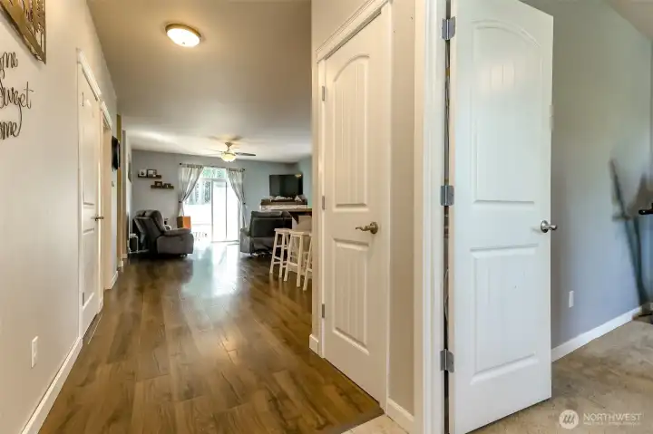 Front entry entry hallway into kitchen