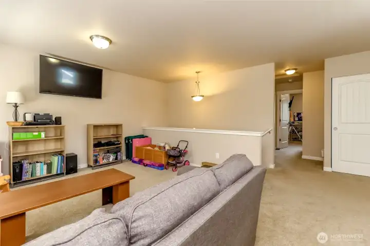 upstairs landing area entertainment or even possible addible bedroom