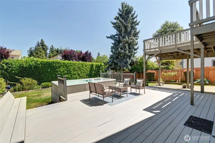 Expansive, multi-level deck with built-in seating frames Mt Ranier views. Expansive, multi-level deck with built-in seating frames Mt Ranier views.