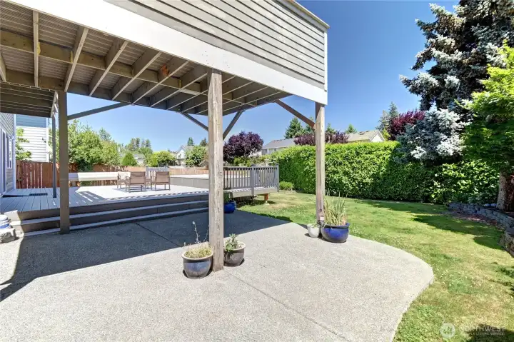 Covered patio extends off lower-level deck. Covered patio extends off lower-level deck.
