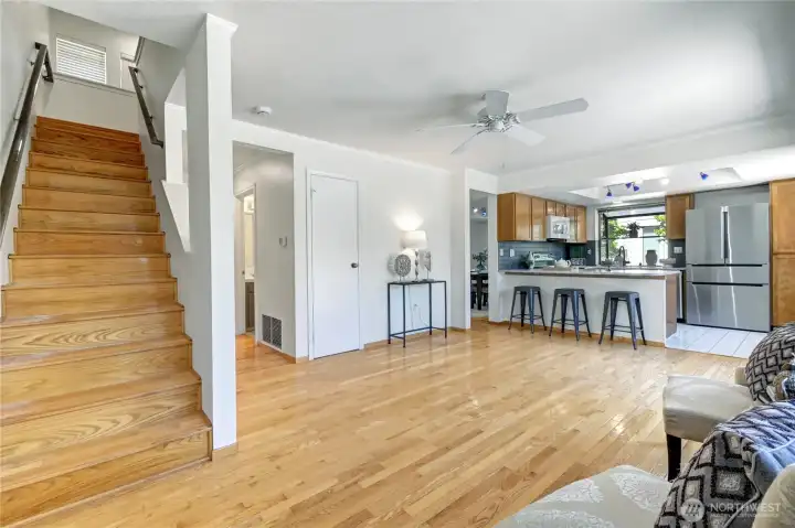 Spacious family room off kitchen with gleaming hardwood flooring. Spacious family room off kitchen with gleaming hardwood flooring.