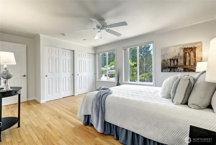 Updated Primary Suite with 6 panel doors, new lighting & hardwood floors. Updated Primary Suite with 6 panel doors, new lighting & hardwood floors.