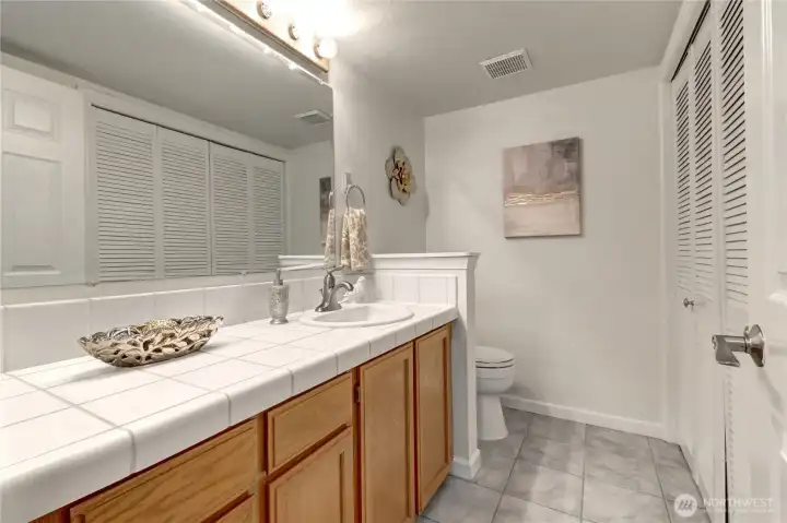 1/2 bath (powder room) downstairs + laundry closet. 1/2 bath (powder room) downstairs + laundry closet.
