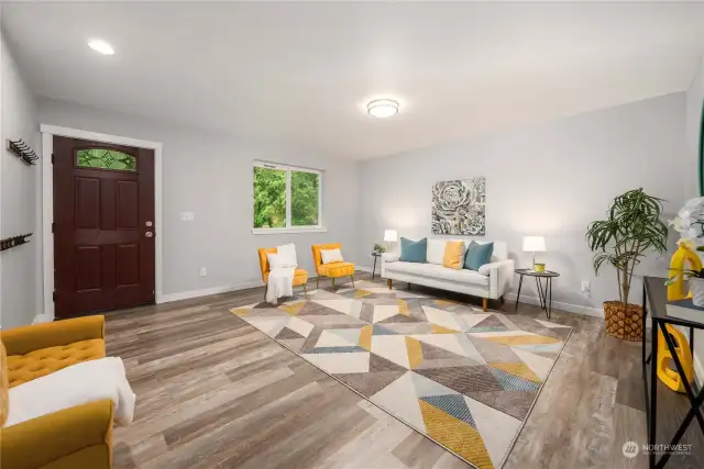 Step into spacious comfort! This living area's got room to breathe, entertain, and cozy up with your favorite people. Welcome home to relaxation central!