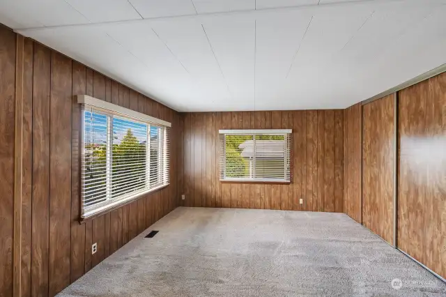 Guest bedroom and or office at front of home. Space for bed, additonal furniture and or office / sewing/quilting machines. Plenty of natural lighting so "no doom and gloom here"! Large double closets too!