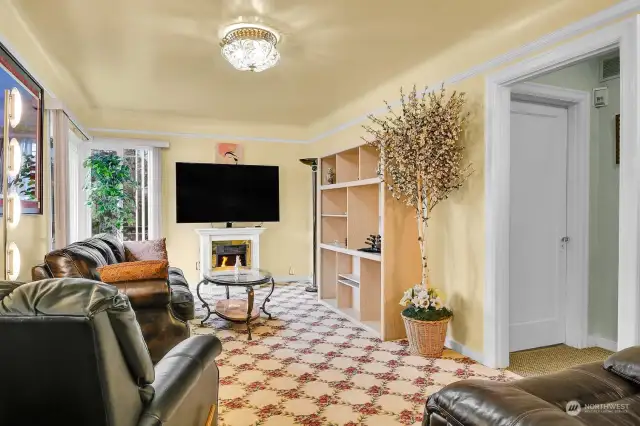 In this view of the living room you can see the door to one of the two main floor bedrooms.