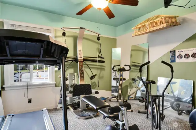 This main floor bedroom is currently used as an in-home gym. The other bedroom on this level is being used for storage (no photo).