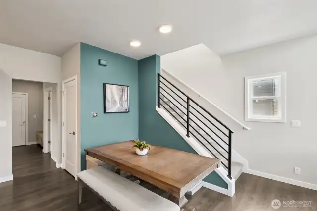 Dining area with mudroom, laundry, powder room to the left.