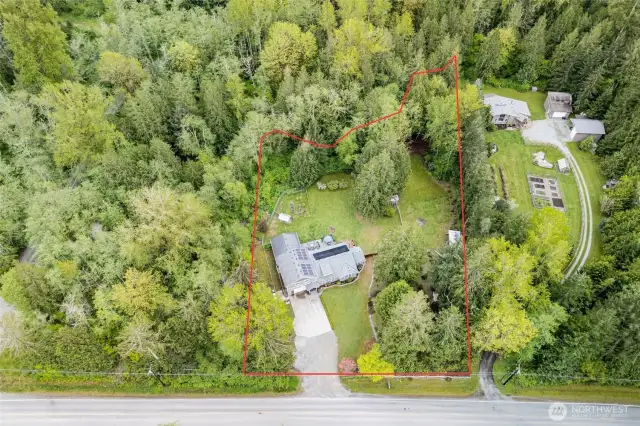 1.7 acres. West lawn contains drainfield