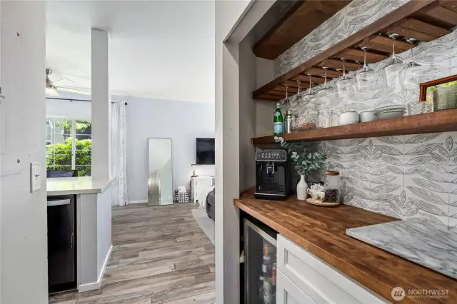 Coffee / Cocktail bar area  Upper shelving with glass drying rack  Butcher block counter  Beverage frig / lower drawer & cabinet