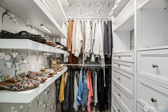 Custom walk-in closet        Built in dresser with jewelry drawer        Wall paper / Shelving