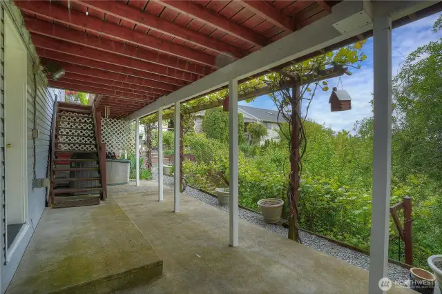 Below the downstairs deck and entrance to the 3rd floor rooms