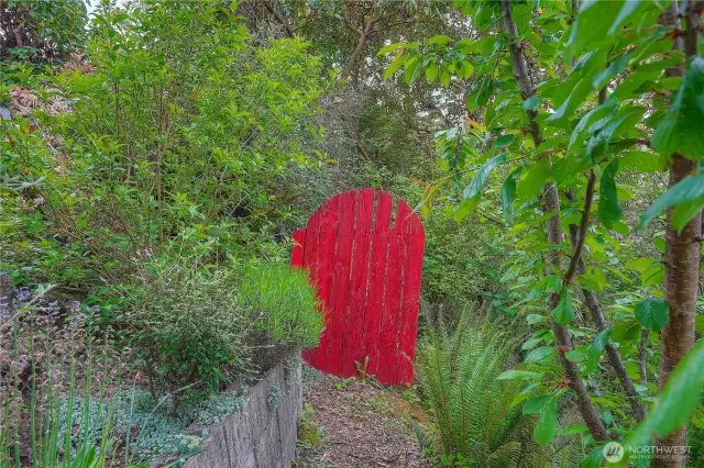 The red fence marks the end of the property.