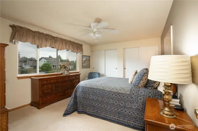 Primary bedroom features two closets